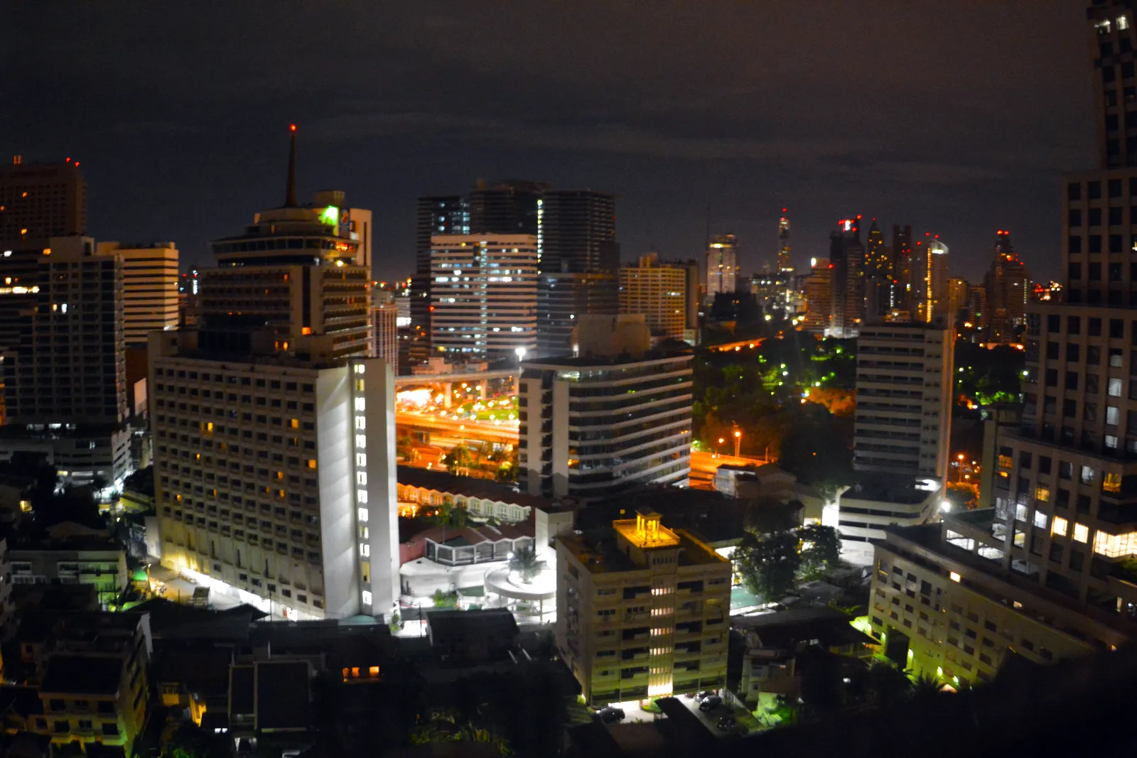 Silom and Sala Daeng nightlife district lit up at night in Bangkok