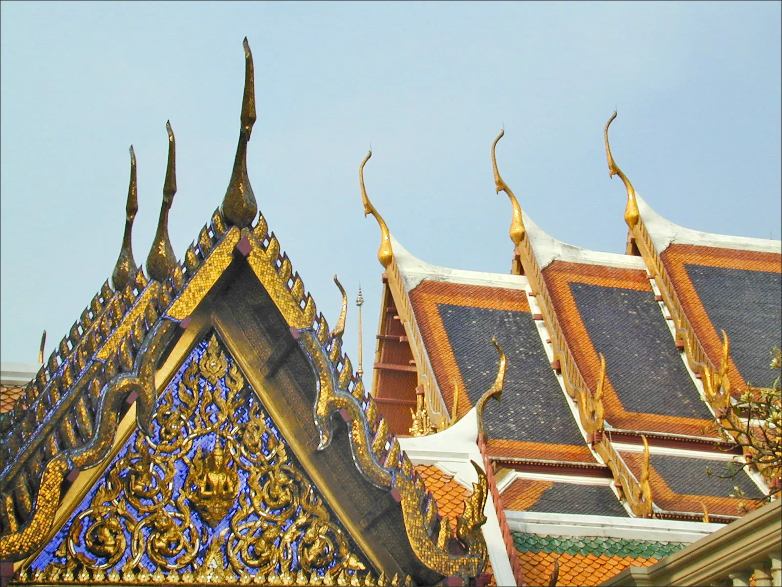 Gold and green roof detail inside Bangkok's Grand Palace complex