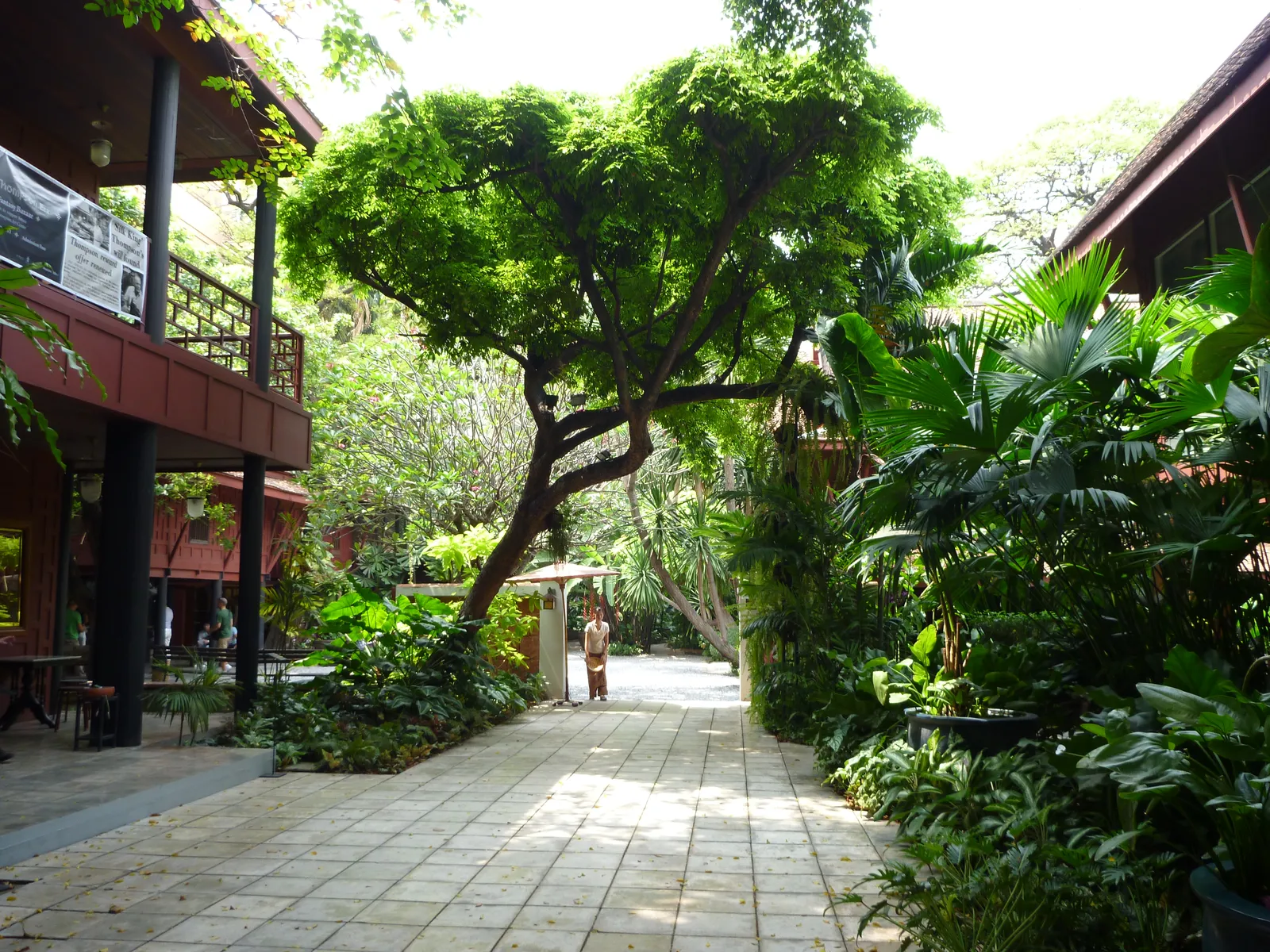 Traditional teak buildings and garden at the Jim Thompson House