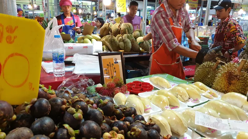Tropical fruit display at Or Tor Kor Market in Bangkok