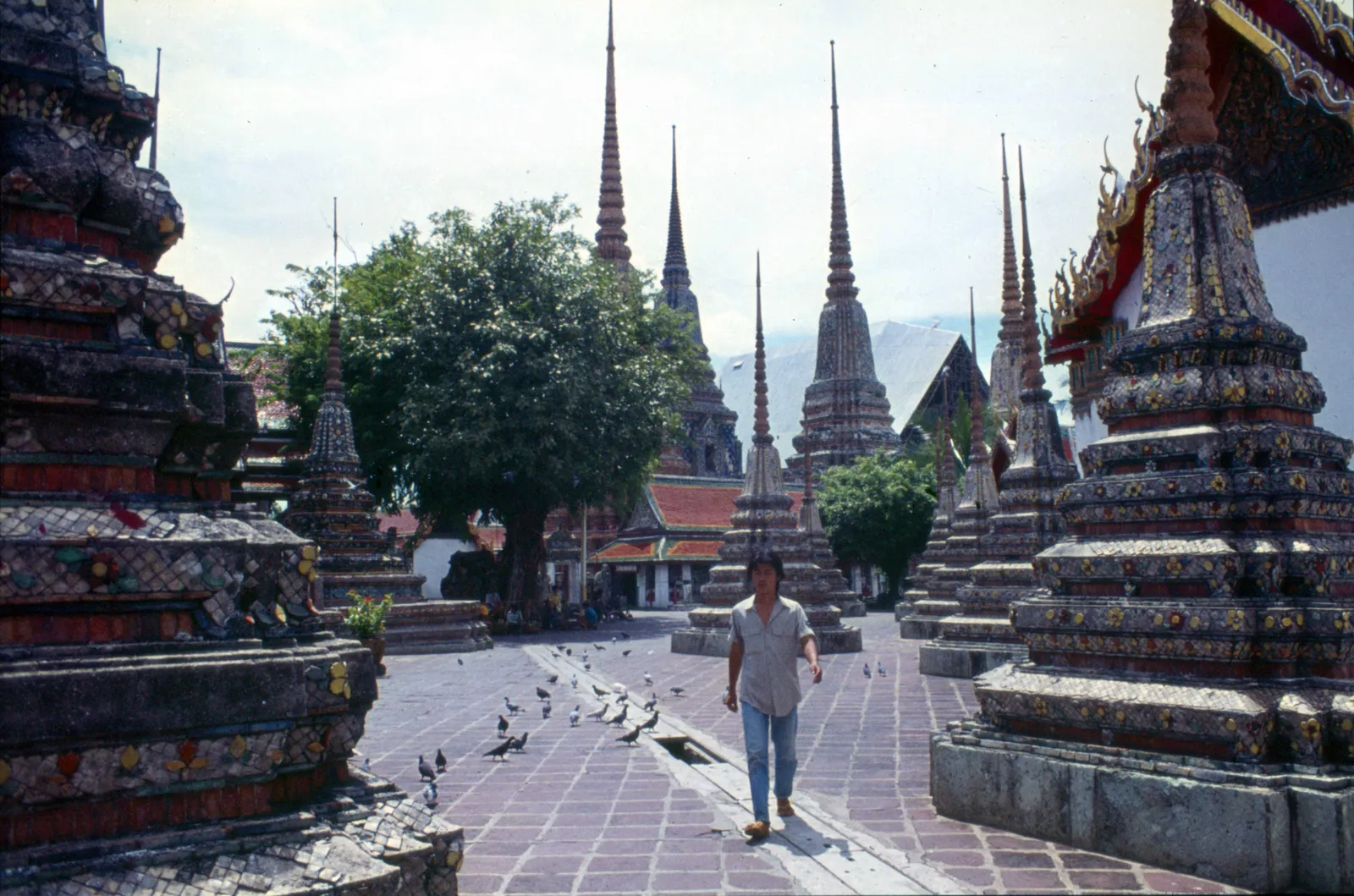 Colorful tiled chedis in the courtyards of Wat Pho