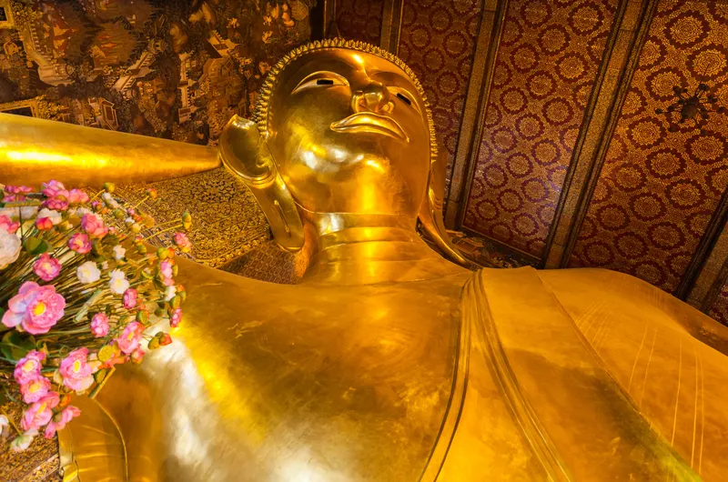 Reclining Buddha statue inside Wat Pho in Bangkok