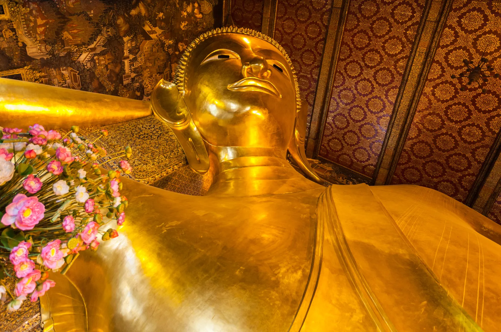 Reclining Buddha statue inside Wat Pho in Bangkok